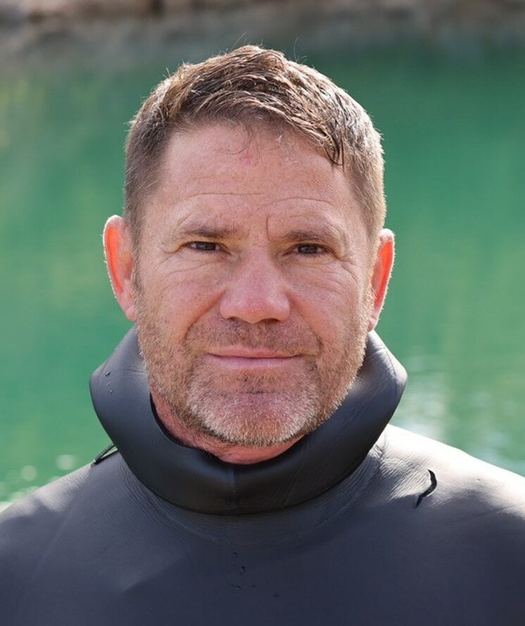 Headshot of Steve Backshall in a wetsuit